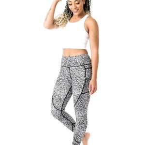 Zyia 7/8 length leggings with pockets
size 4 black gray white nylon spandex